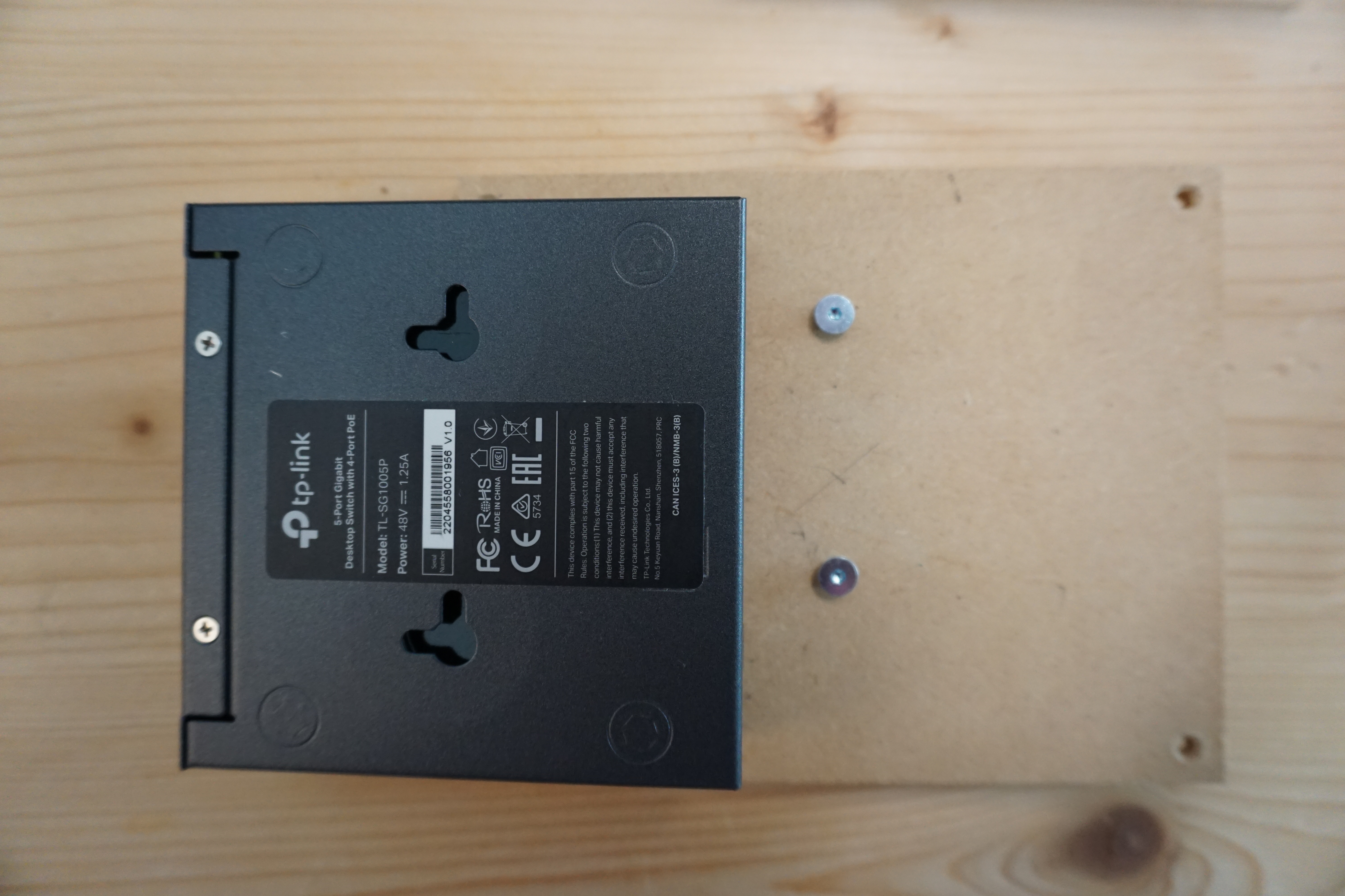 Simple wooden plate to attach the POE Switch using the wall-mount holes